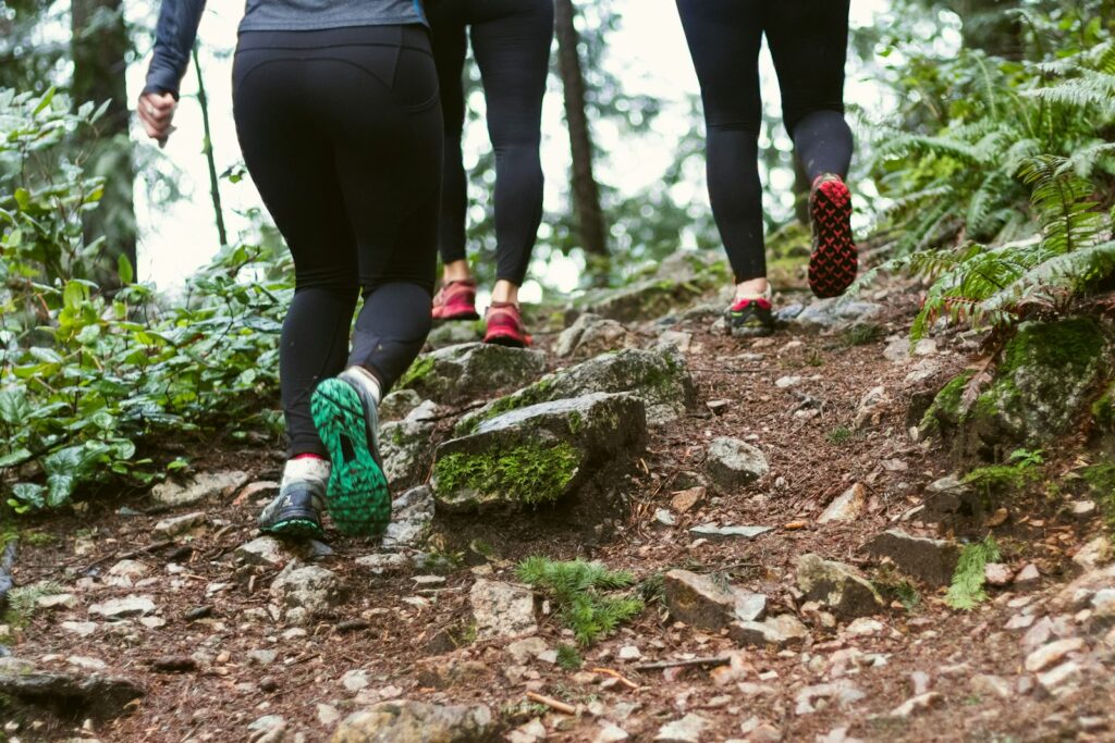 Running shoes on an outdoor path in warm weather