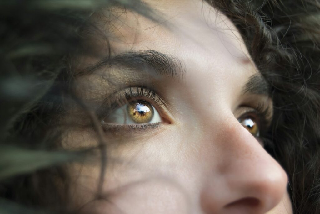 Close-up of a woman's relaxed brow and forehead with natural expression