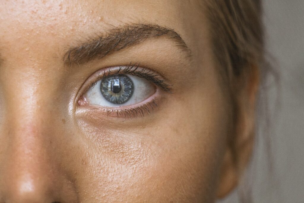 Close-up of a woman's relaxed forehead and brow area