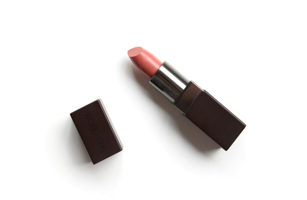 Flat lay of lip products in soft neutral shades | LightTouch Med Spa Flat lay of lip products in soft neutral shades