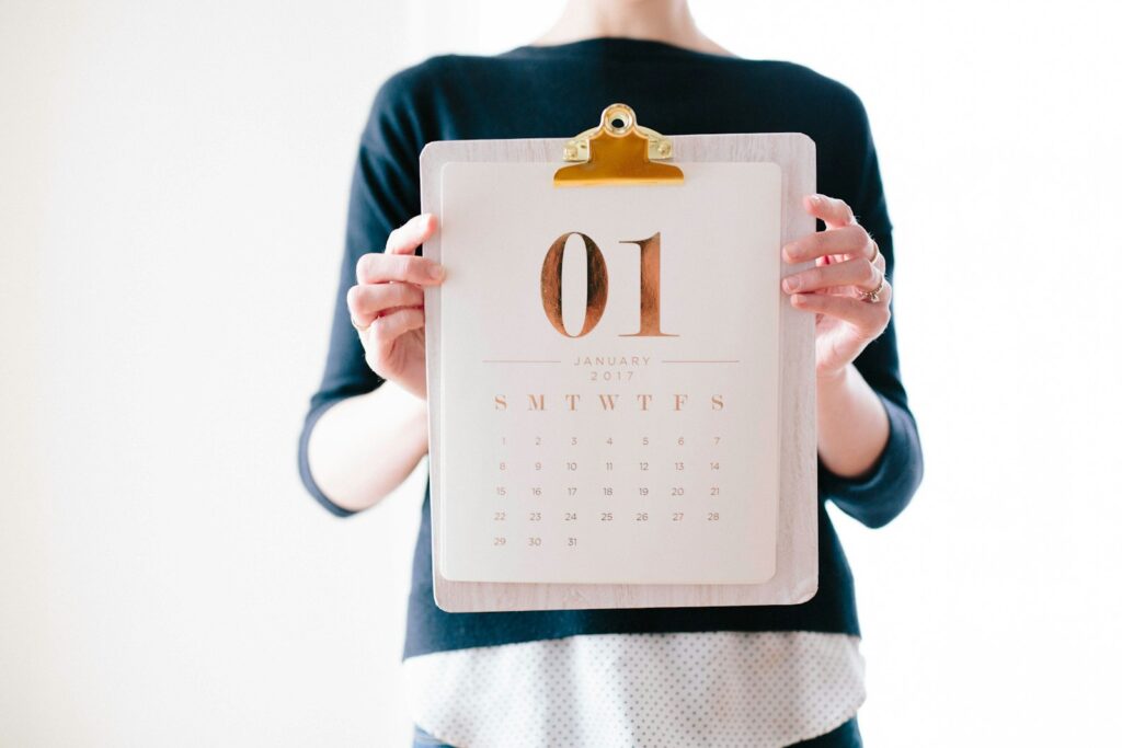 Woman checking a calendar while tracking her Botox results over two weeks