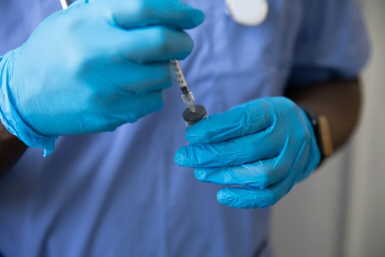 Nurse practitioner preparing a syringe, illustrating who can administer Botox in Florida